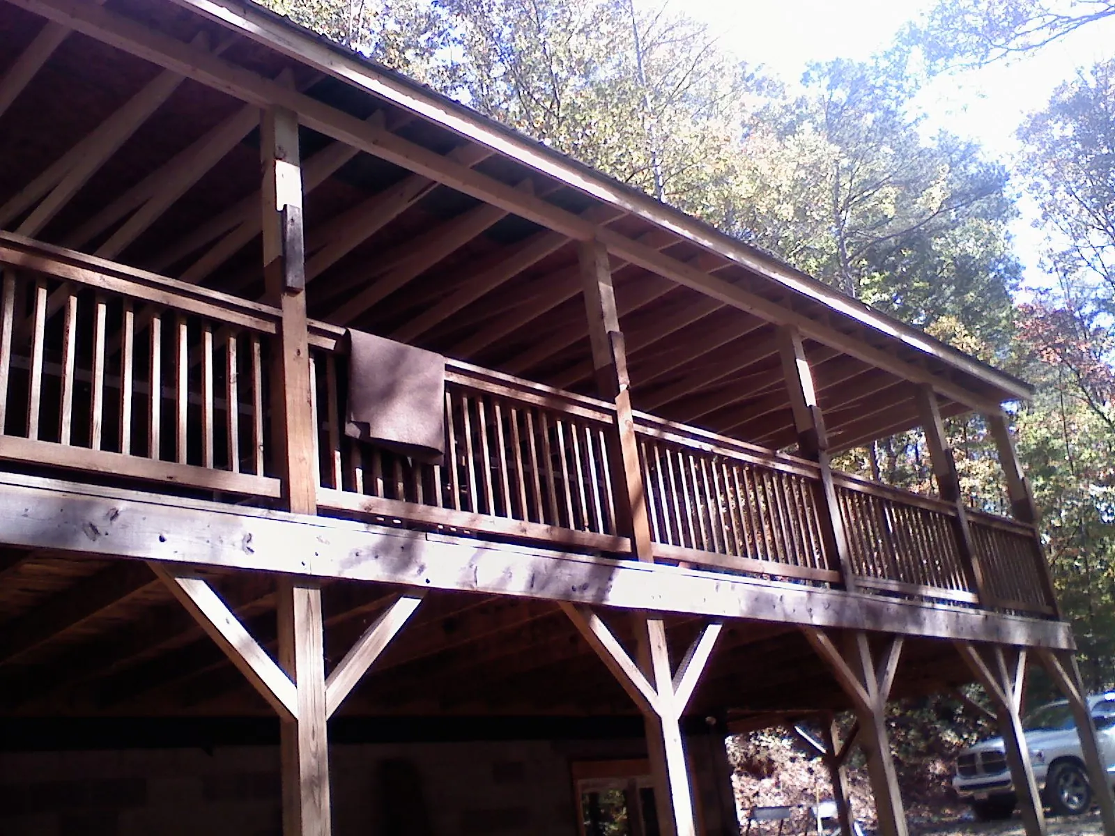 Timber framing under a new elevated porch and deck — Roof Leak Repair in Montclair by Roofing Brothers